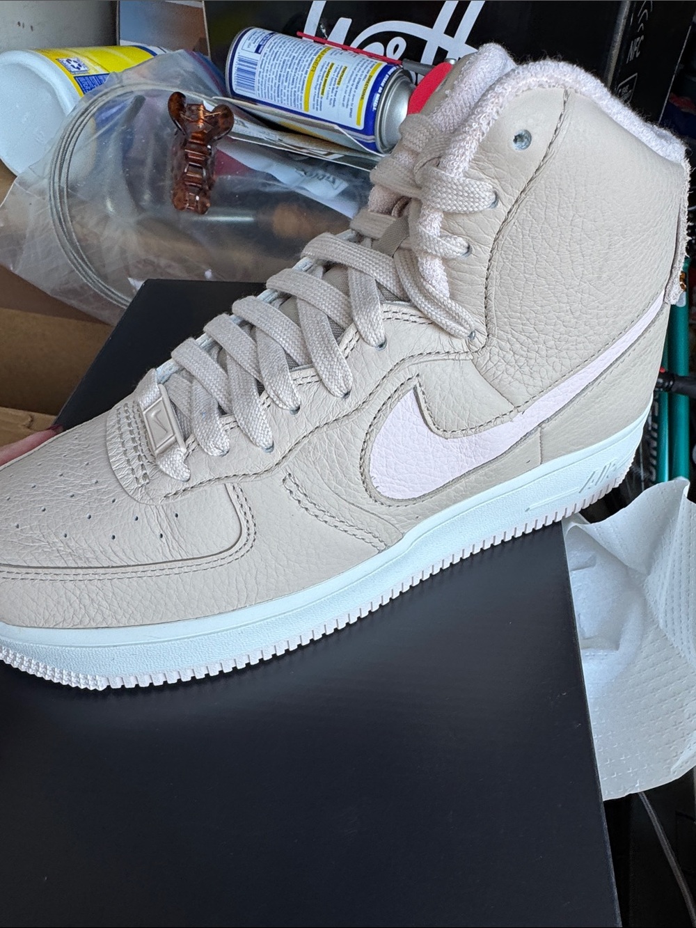 Nike Women’s Light Beige High-Top Sneakers with Pale Pink Swoosh